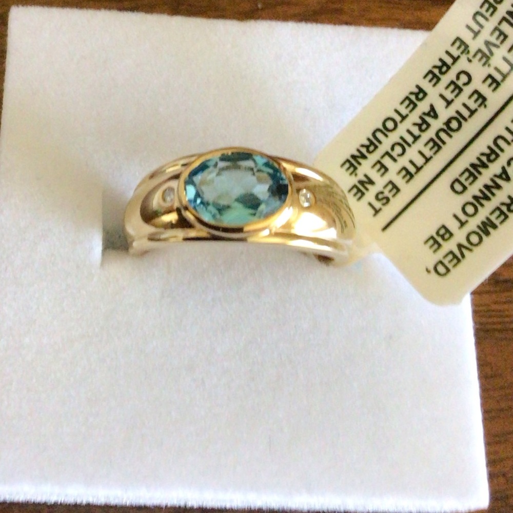 Sterling Silver Blue Topaz Ring with Diamond Accents